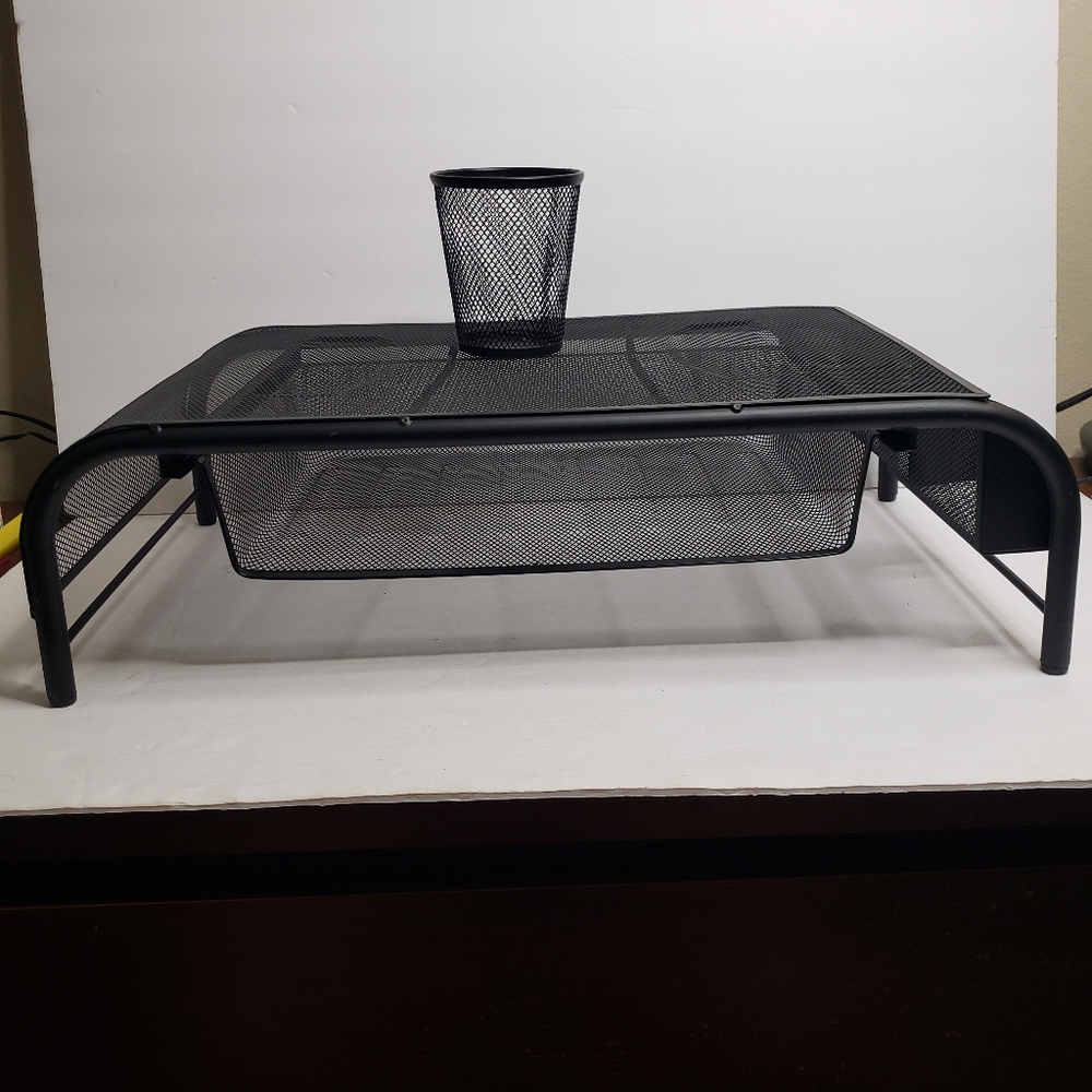 Monitor or laptop stand with a drawer, and cup.   249